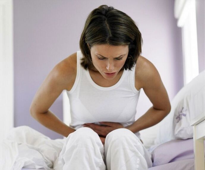 A woman is worried about the symptoms of a helminth infection